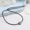 cn-11134207-7r98o-lrplbk6bee99de.webp Black Spinel Cat Shell Necklace