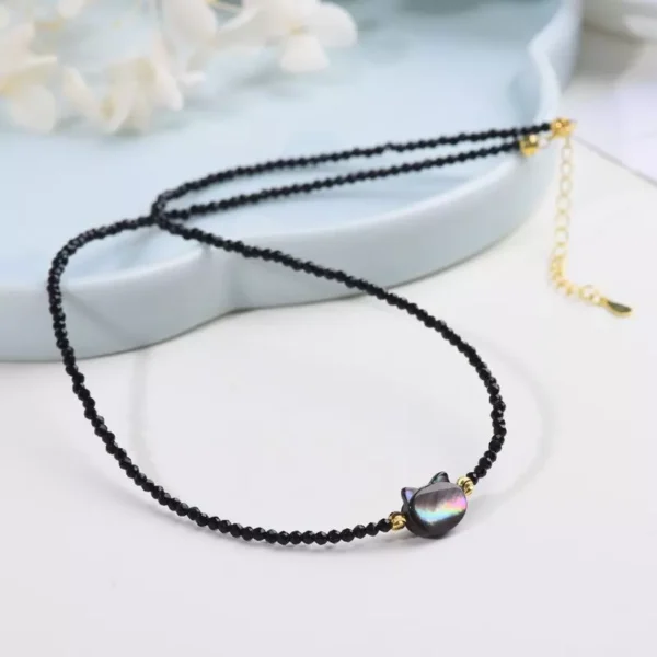 cn-11134207-7r98o-lrplbk6bee99de.webp Black Spinel Cat Shell Necklace