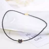 cn-11134207-7r98o-lrplbk6bfstpfe.webp Black Spinel Cat Shell Necklace