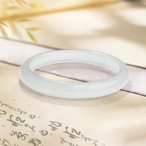 cn-11134207-820l4-msp92tr325mye9.webp CHOW TAI SENG White Chalcedony Bangle