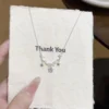 sg-11134201-825ak-mrtmegsdbtogfd.webp Zircon Stars Moon Bow Pendant Necklace