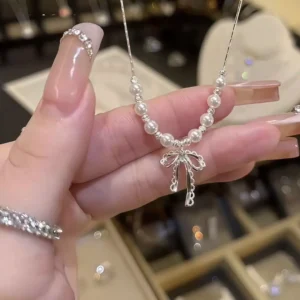 sg-11134201-825aq-mr6tdtzwyayo2f.webp Alloy Bow Pearl Necklace